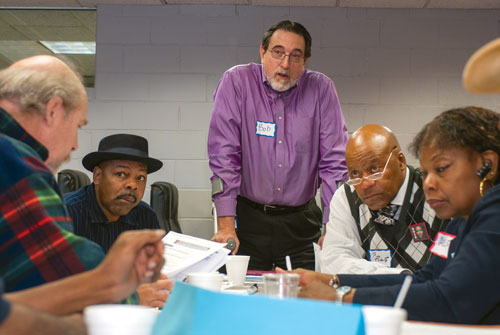 Bob Brown works with community members in Flint